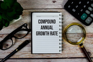 Compound Annual Growth Rate (CAGR) text on notepad, Business and Financial concept background