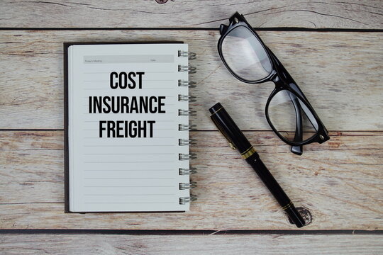 Cost Insurance Freight (CIF) text on notepad, Business and Financial concept background