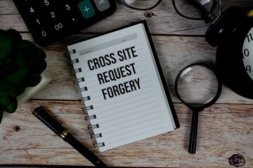 Cross Site Request Forgery (CSRF) text on notepad, Business and Financial concept background