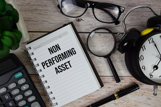 Non Performing Asset (NPA) text on notepad, Business and Financial concept background