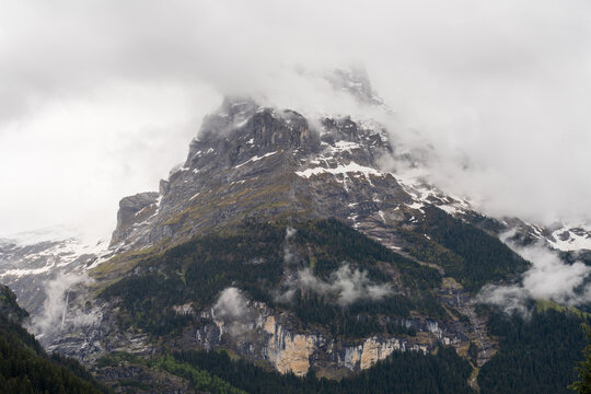 Grindelwald village located in Switzerland&rsquo;s Bernese Alps, Eiger Mountain, Gletscherschlucht, waterfalls and striated limestone walls