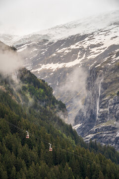 Grindelwald village located in Switzerland&rsquo;s Bernese Alps, Eiger Mountain, Gletscherschlucht, waterfalls and striated limestone walls