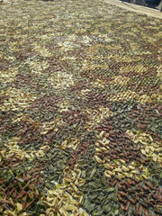 Camouflage net woven by hand from ribbons