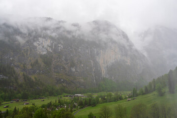 Lauterbrunnen, Village in Switzerland, in the Swiss Alps, Beautiful Valley with rocky cliffs and...