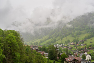 Lauterbrunnen, Village in Switzerland, in the Swiss Alps, Beautiful Valley with rocky cliffs and...