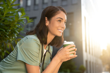 Young female doctor having coffee in the morning after a night shift