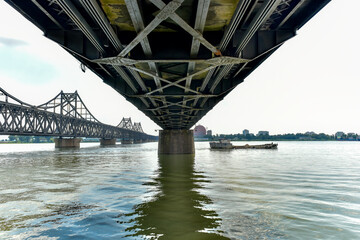 The steel bridge connecting the Yalu River in China to North Korea