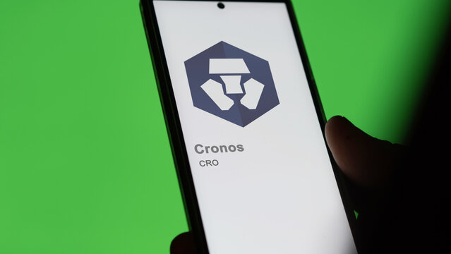 Close up on logo of (CRO) cronos on the screen of an exchange. (CRO) cronos price stocks, $CRO on a device.