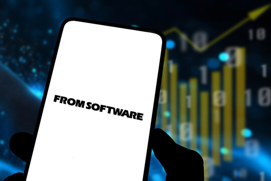 London, UK, 11.07.2024: FromSoftware logo on mobile phone display with stock market background