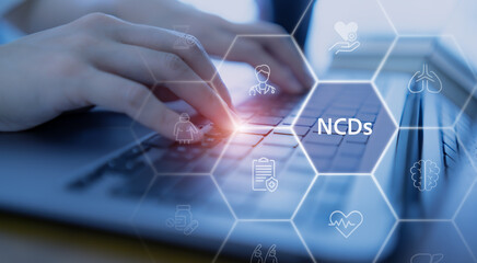 Prevention, detection and treatment of NCDs concept. Searching information, computer with NCDs icons related to non-communicable diseases (NCDs).