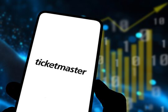 London, UK, 11.07.2024: Ticketmaster logo on mobile phone display with stock market background