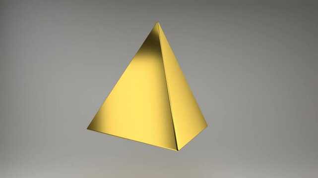A golden pyramid rotates around its axis on a gray background. Realistic 3D rendering of a tetrahedron. Looped footage.