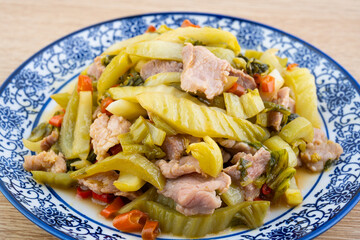 Chinese food: pickled cabbage and fried meat
