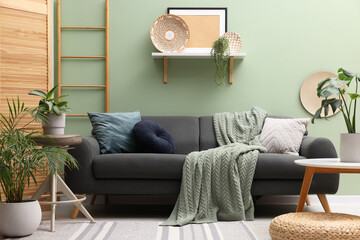 Living room with stool and sofa. Stylish interior design