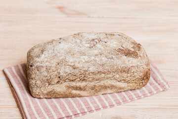 Fresh homemade crisp bread on napkin, top view. Healthy unleavened bread. French bread. Top view Bakery products