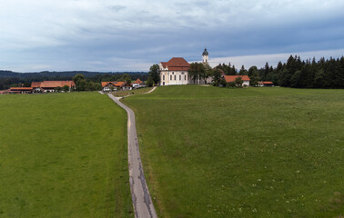 Fototapeta premium Aerial drone shot of the famous old Wieskirche church near Steingaden, Bavaria