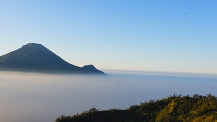 Dieng plateau. View of Dieng plateau in sunrise moment and in bluesky. The highest plateau island in Java, Indonesia.