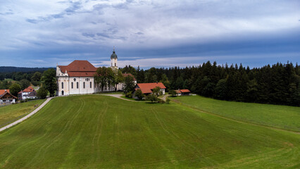 Aerial drone shot of the famous old Wieskirche church near Steingaden, Bavaria