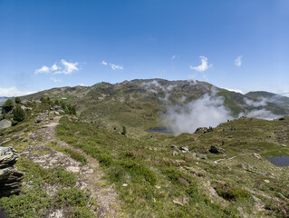 Hiking Karspitze one of the peaks on Nordkette mountain range in Tyrol, Austria in summer