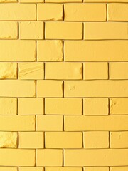 Fototapeta premium Seamless wall background of Yellow natural sandstone tiles stitched with clay, seamless