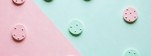 Event invitation background featuring playful polka dots in pastel pink and mint green, perfect for children’s parties or casual gatherings