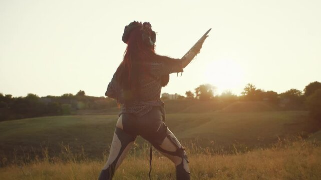 As the day fades into night, a group of women, their faces aglow with the light of tradition, honor the sacredness of nature, their presence a testament to pagan beauty.