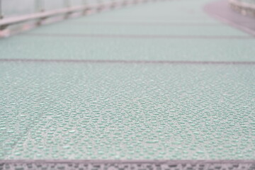 
Raindrops on the glass floor of the northernmost skywalk in Siam, Mae Sai District, Chiang Rai Province, Asia, Thailand
