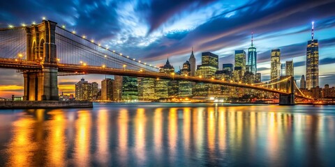 Fototapeta premium Stunning Long Exposure of Brooklyn Bridge with Lower Manhattan Skyline at Night, Showcasing the Beautiful City Lights and Reflections on Water for High-Quality Stock Photography