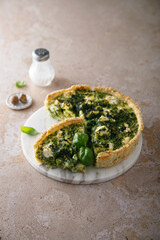 Homemade quiche with spinach and feta