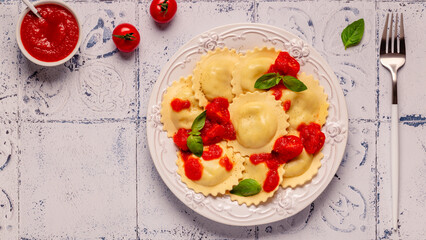 Ravioli with tomato sauce and basil
