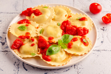 Ravioli with tomato sauce and basil