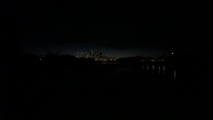 Downtown city in distance, darkness, Calgary, Alberta, Canada