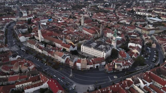 Aerial video capturing the historic city center of Sopron, Hungary, with its iconic medieval and Baroque architecture and the Firewatch Tower.