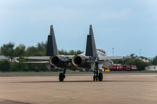 MAKS-2013. Soviet-Russian multi-role fighter Su-35 (NATO - Flanker-E) of "four plus" generation, plus taxis along take-off runway. Aircraft close-up. Zhukovsky, Russia - August 27, 2013