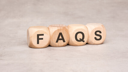 Wooden blocks with FAQ letters designed to enhance informative content and user experience