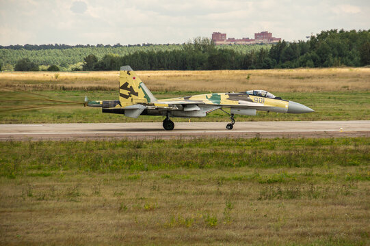 Soviet-Russian multi-role fighter Su-35 (NATO - Flanker-E). "Four plus" generation. Moves along concrete runway after landing. 100 years of Russian Air Force. Zhukovsky, Russia, August 10, 2012
