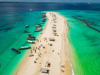Zanzibar, Tanzania. Blue Indian Ocean full of boats and yachts near the coastline © VasylisaDvoichenkova