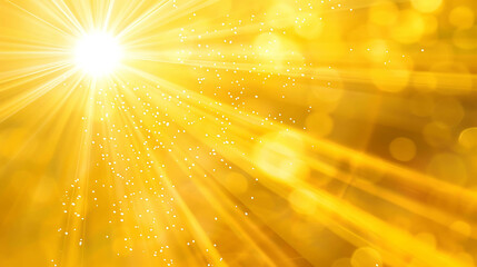 Warm yellow rays of light from the upper right corner with a white dot in the center on a blurred background of yellow bokeh.
