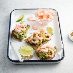 Avocado sandwiches with shrimps