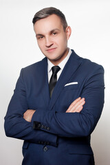 Portrait of handsome man in black blue suit