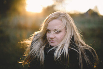 Reflective Gaze in the Golden Hour Light