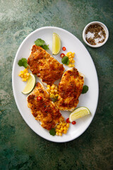 White fish fillet with pepper paste and corn