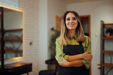 Happy Hairdresser Standing with Arms Crossed in Beauty Salon. Professional hairstylist working self-employee in her business
