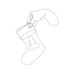 Line art hand holding a New Year's sock with a Christmas tree. Vector illustration on a white background. New Year's mood, holiday. Postcard, banner, icon.