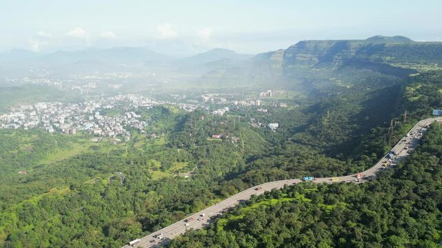 beautiful lonavala sahyadri hills bird eye view drone moving top to bottom in maharashtra.