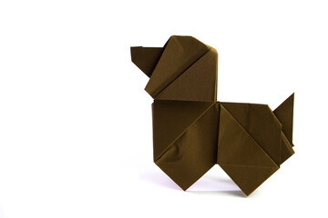 Paper dog on white background. Origami dog. Nature concept