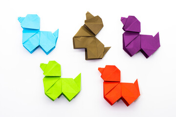 Paper dog on white background. Origami dog. Nature concept
