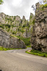 A road leading through the cliffs of Cheddar Gorge. Cheddar, Somerset, England