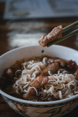 Pork chop noodles, a classic street food in Macau, China