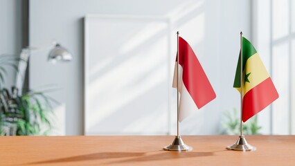 FLAGS OF INDONESIA And SENEGAL ON TABLE